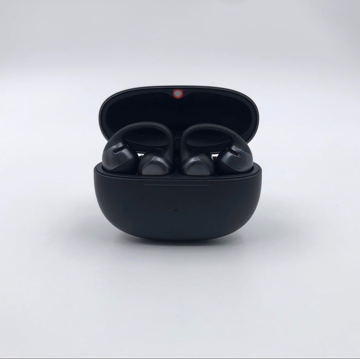 Shokz OpenDots ONE noirs dans leur boîtier de charge